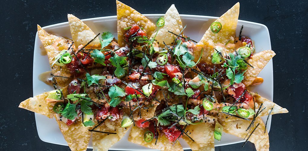 A fun way to have poke: on wonton chips and topped with three different sauces. Yard House’s Carlito Jocson was inspired to create this seafood snack after a visit to Hawaii.
