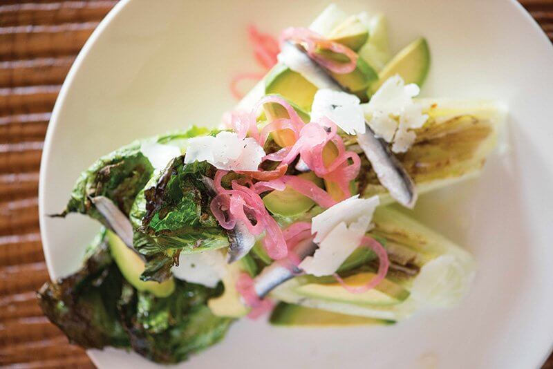 More substantive than baby greens, hearts of romaine anchor this salad at Shakewell in Oakland, Calif., topped with manchego, avocado and boquerones and tossed in a sherry-manchego vinaigrette.