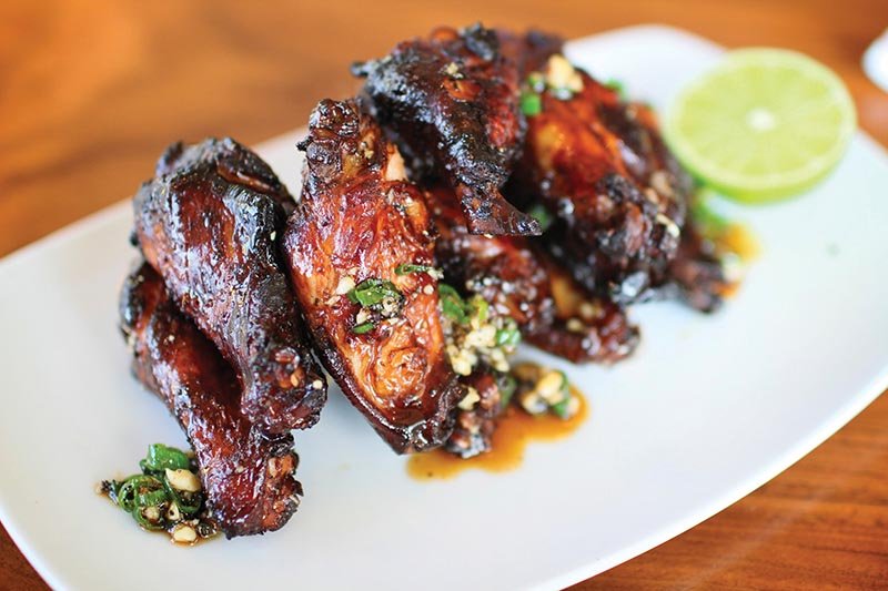Founding Farmers’ Black Pepper Wings deliver a craveable bite through the glaze, made with black pepper, soy, garlic and lime juice. 