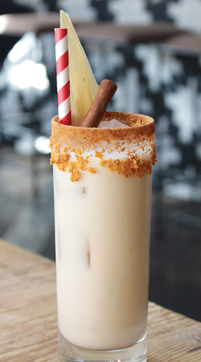 The Cornstar cocktail at Gracias Madre in Los Angeles plays with Latin flavors, combining cornchata (horchata with corn instead of rice), cornflake-washed reposado tequila, Mezcal Vago Elote, agave and aromatic bitters. A cinnamon-cornflake rim completes the fun.