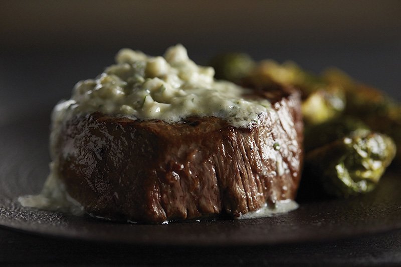 Blue cheese butter, created by Chef Todd Kniess of Bistro Liaison in Berkeley, Calif., tops protein perfectly.