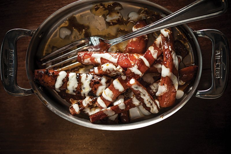 Carrots are transformed at Lo Spiedo in Philadelphia —they’re grilled until smoky and tossed in barbecue sauce, then finished with a rich ranch dressing.