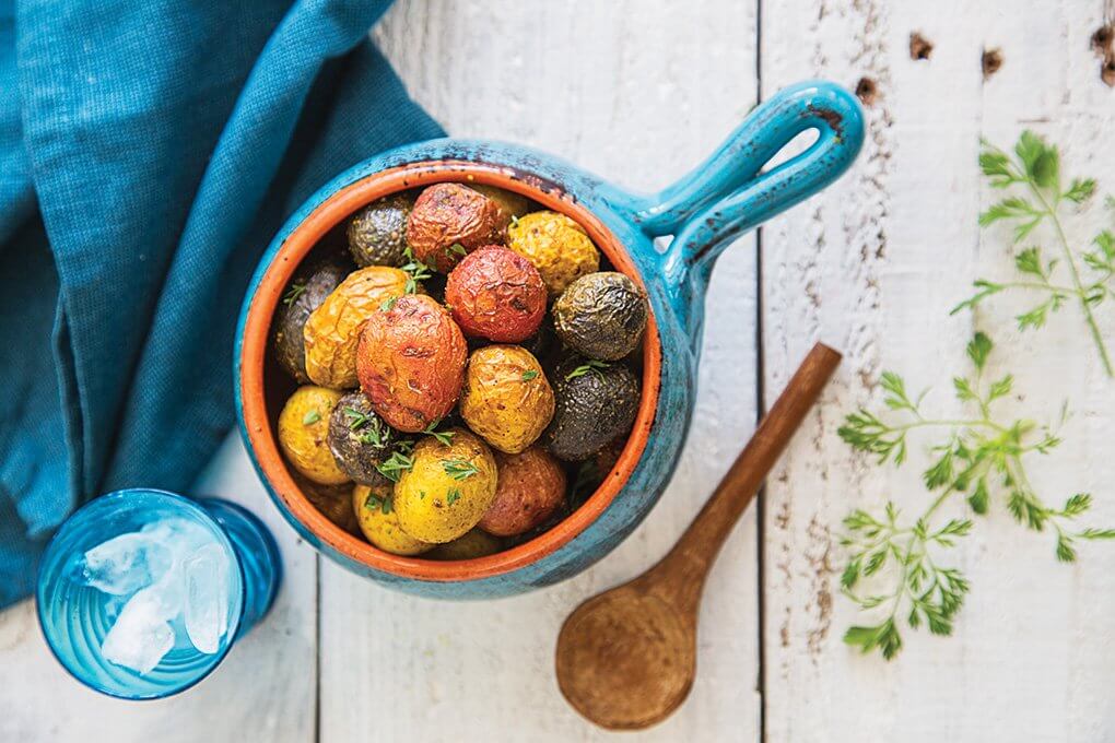 Familiar potatoes become modern and flavor-forward at Tava Kitchen, an Indian-inspired fast casual. Oven-baked whole marble potatoes are dusted with Tava spice for a signature, yet approachable side dish.