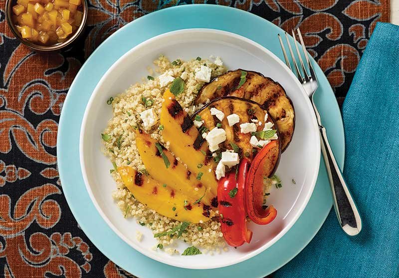 Harissa-spiced grilled eggplant and rum-spiked grilled mango add flavor depth.