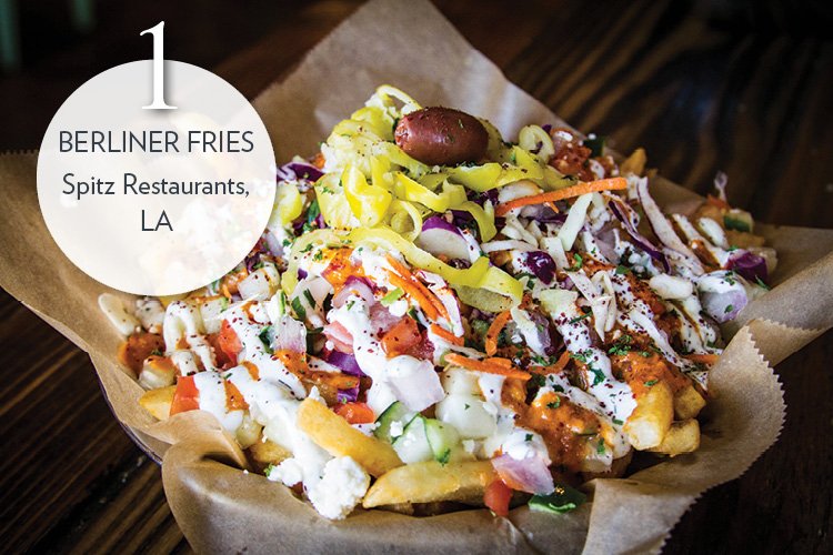 Berliner Fries with Berliner red sauce, tzatziki, carrot-cabbage slaw, tomato, green pepper, olive, onion and pepperoncini