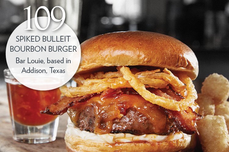 Spiked Bulleit Bourbon Burger with spiked housemade sauce with Bulleit bourbon, topped with cheddar cheese, cream cheese, applewood-smoked bacon and crispy onion strings