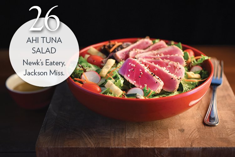 Ahi Tuna Salad with radishes, carrots, cucumbers, tomatoes, greens and ginger-wasabi dressing.