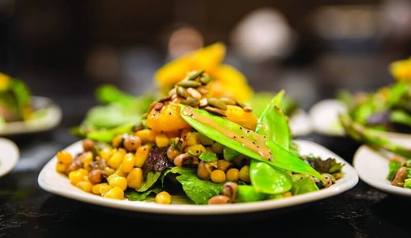 Served at Adobe’s offices, this black-eyed peas salad with snow peas, mustard greens, corn, orange, pumpkin and sunflower seeds displays the innovation found today in forward-thinking B&I cafeterias.