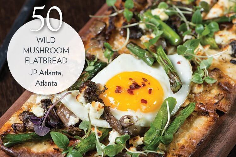 Wild Mushroom Flatbread with goat cheese, arugula, and egg fried in olive oil