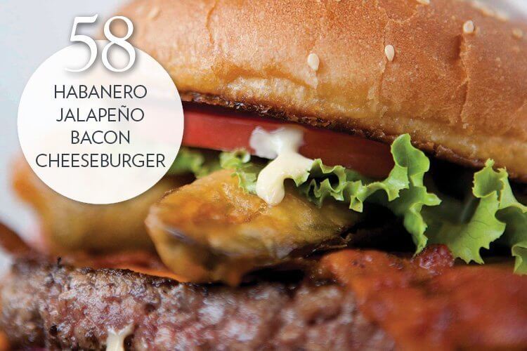 Habanero Jalapeño Bacon Cheeseburger with habanero-jalapeño cheddar cheese, bacon, batter-fried jalapeño, habanero mayonnaise, lettuce, tomato, red onions, heat-blistered jalapeño