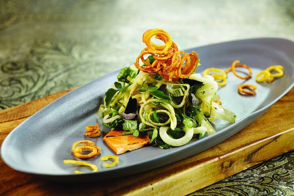 Dirt Candy’s Amanda Cohen makes a spiral potato salad using Idaho Russets and Yukon Golds, quickly sautéed and dressed for optimal texture.