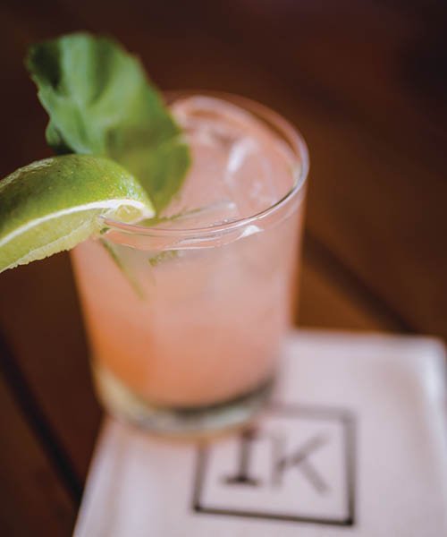 The Elderflower Paloma at Ivy Kitchen in Dallas gets its essence from St-Germain elderflower liqueur, along with Tanqueray, lime, simple syrup, grapefruit juice and basil leaves