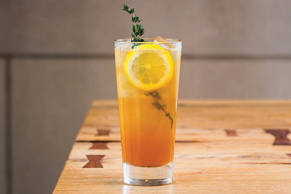 The Tea Thyme at CBD Provisions in Dallas features distinctive herbal notes from thyme-infused gin with French amer, Maraska, lemon and club soda