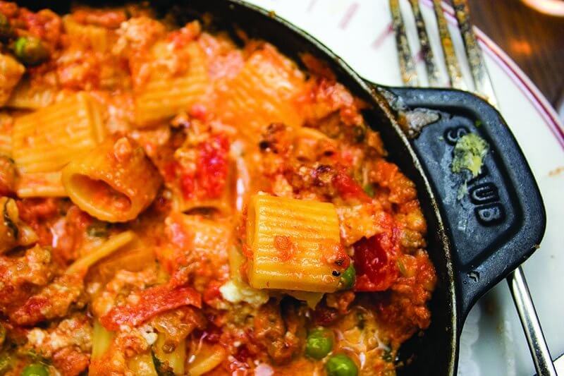 The Baked Rigatoni at Eastern Standard in Boston—featuring lamb and pork sausage, pink sauce and ricotta—has been ordered more than 58,000 times. A French take on an Italian dish, it’s served in a cast-iron skillet under a Parmesan crust.