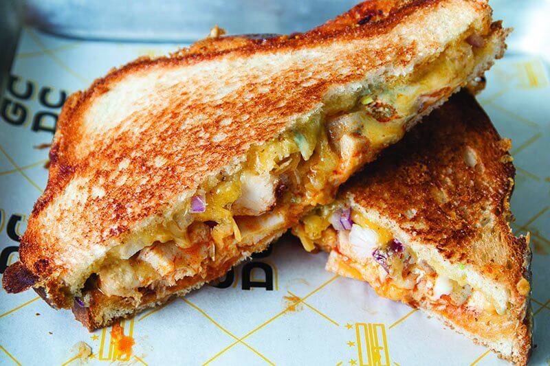 The beloved Buffalo flavor system works its magic on the Buffalo Blue Grilled Cheese at GCDC, incorporating blue cheese, Buffalo chicken and hot sauce.