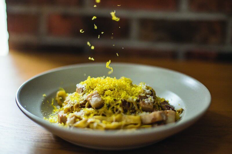 Pork belly braised in apple cider and cured grated egg yolks help make the Carbonara at Tre Rivali a modern yet rustically appealing dish.