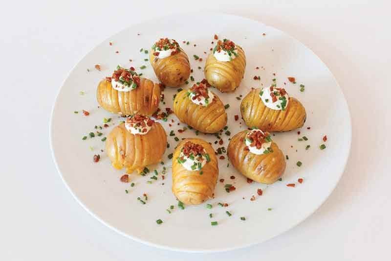 Mini potatoes offer a unique canvas for Hasselback technique—combining eye-catching presentation with flavor-catching grooves.