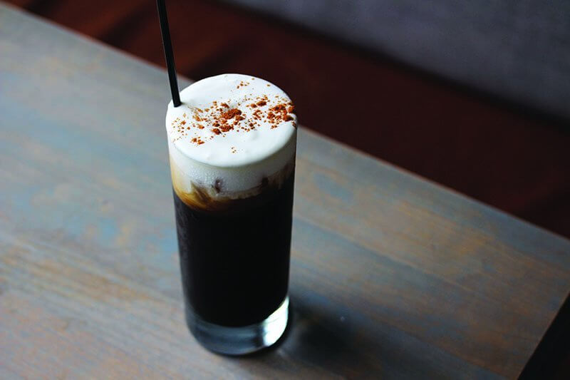 Brunch gets a boost with the coffee cocktail #INeedCoffee at Love & Salt. Bourbon and amaro combine with cold-brew coffee, and a finish of cream completes the power drink.