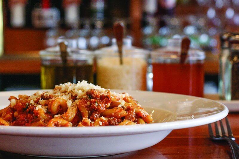 Pastaria’s Strozzapreti with “Pastaria Bolognese” and Grana Padano is one of the most popular dishes on the menu, thanks to how well the pasta picks up the homey, flavorful sauce.