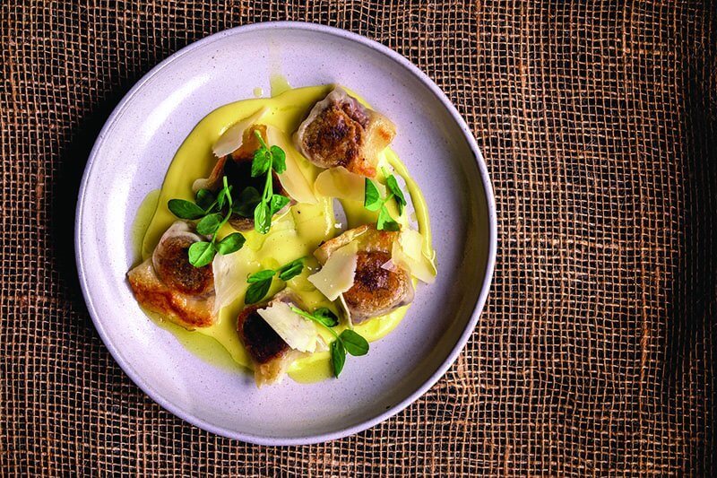 The Pubbelly short rib dumplings get an extra dose of umami from the inclusion of Gruyère cheese.