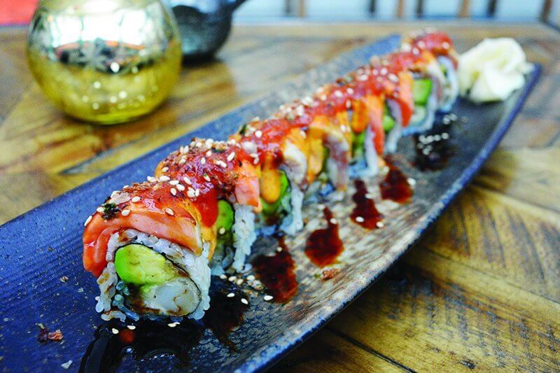 A power combo of spices blend together in the Spicy Slap Roll. Sambal, Sriracha and sweet chile sauce bring heat and flavor to the shrimp tempura and avocado roll.