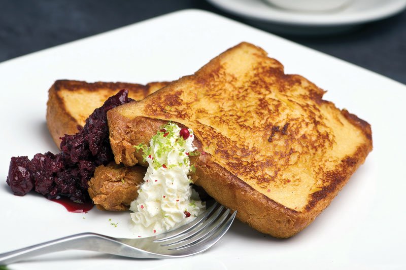 The Malted Custard French Toast takes a sophisticated approach at Jam in Chicago. Macerated fruit and lime-leaf cream with pink peppercorns complete the picture.