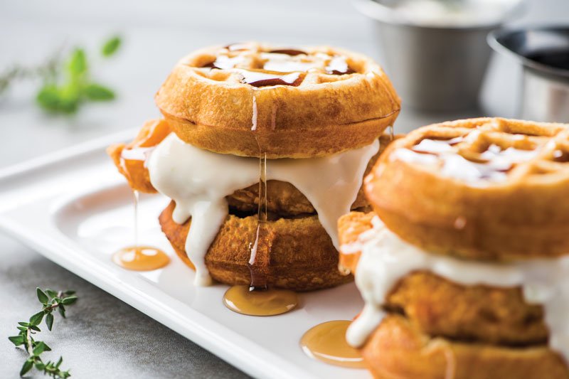 Serving up fun with this duo of sliders, Topgolf offers crispy chicken tenders sandwiched in housemade Belgian waffles