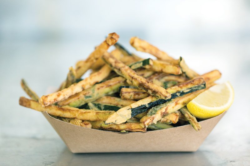 Gott’s Roadside in Northern California makes seasonal vegetables craveable and snackable by coating them with a batter flavored with herbs, then frying until golden and crisp.