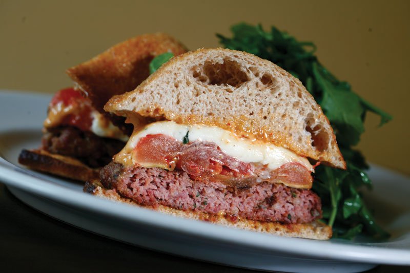 At Rioja in Denver, Jennifer Jasinski’s lamb burger is known for being thick and juicy, with a chunky grind and subtle smoky components.
