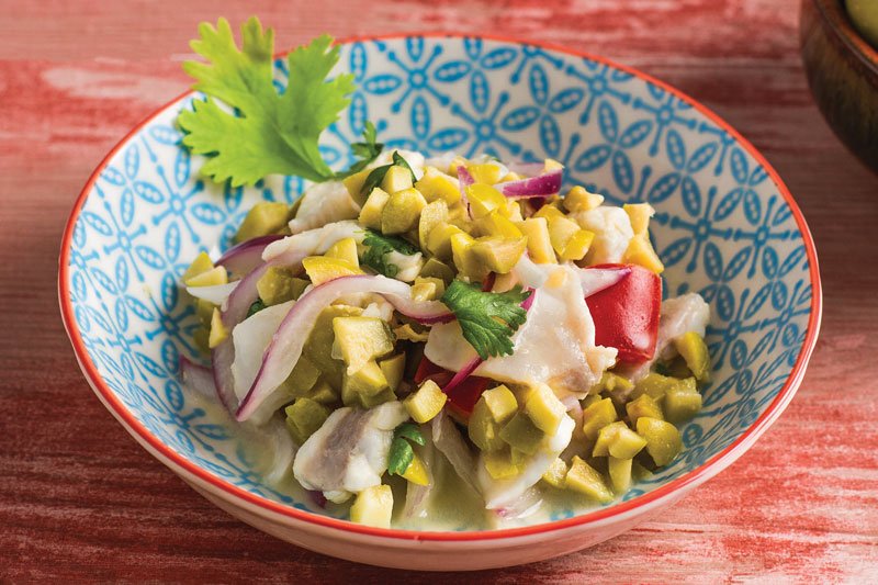 Thoughtful substitutions can elevate any seafood dish. This bright ceviche stars sea bass and olives—a different twist on a trending favorite.