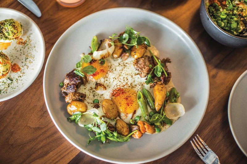 Modern hash takes on new forms. The Pork Hash at Alta, in San Francisco, combines new potatoes with fried peppers, mustard soubise and two sunny-side-up eggs.