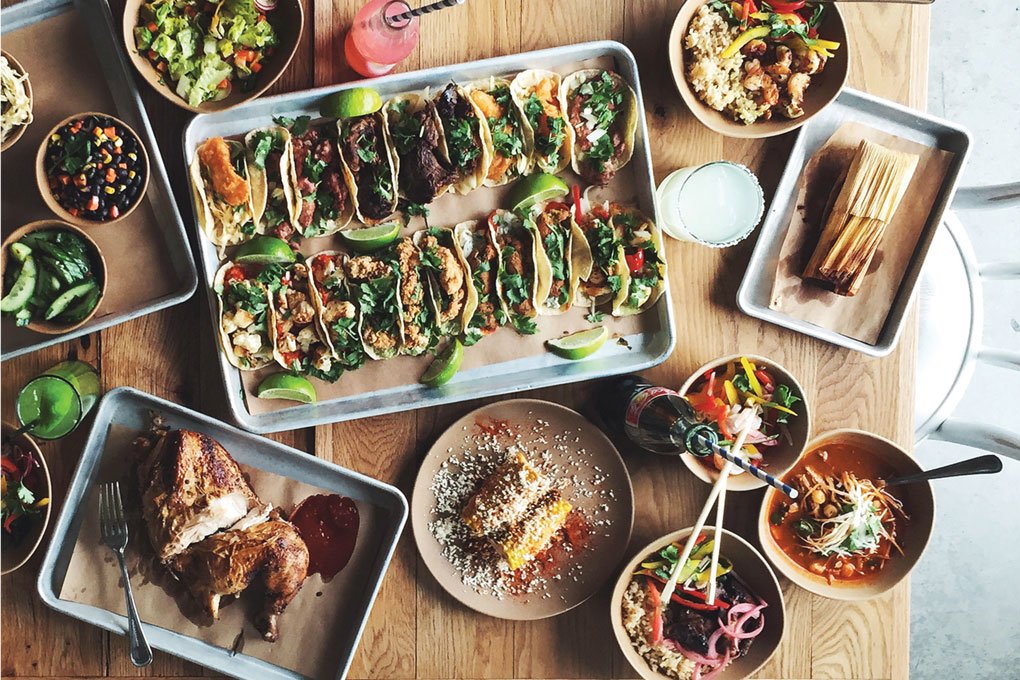 The casual, beachy vibe at Bartaco encourages sharing and experimentation, typical of today’s taco tavern. The menu features tacos filled with everything from duck to falafel, and the “not tacos” selection ranges from posole to poke.