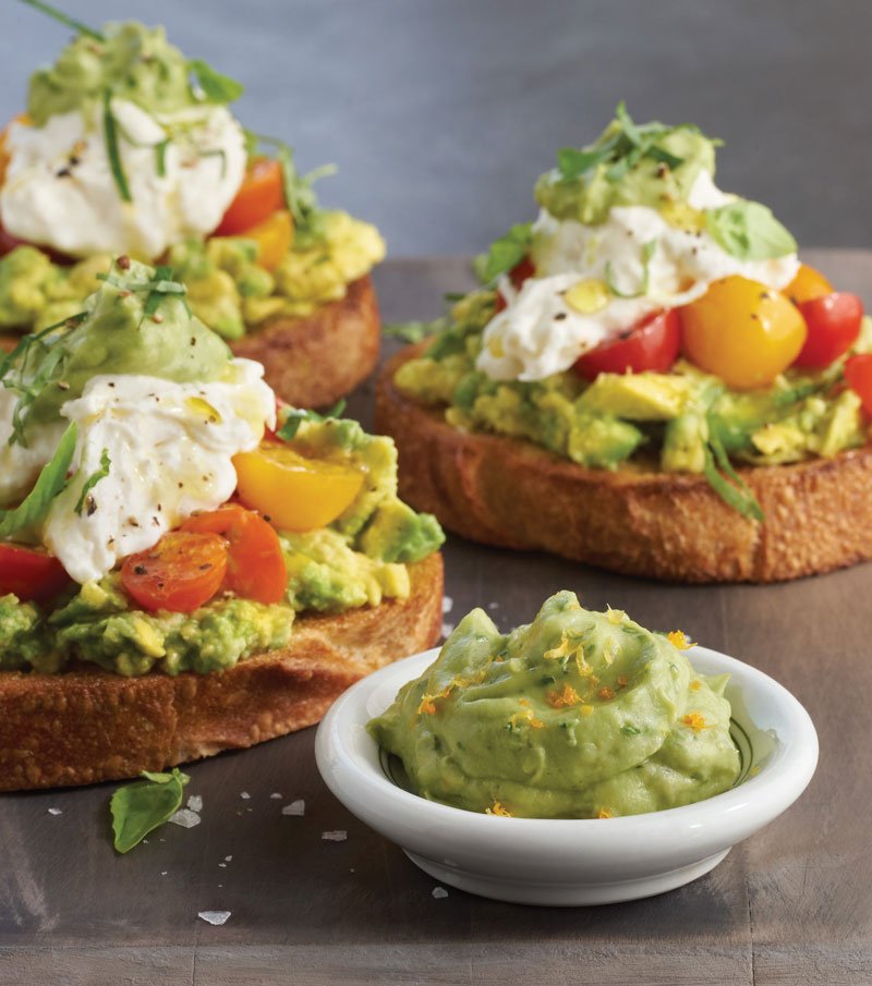 Citrus-basil avocado mousse adds an airy finish to Burrata Caprese Avo-Toast, introducing yet another textural component to a trending toast application.