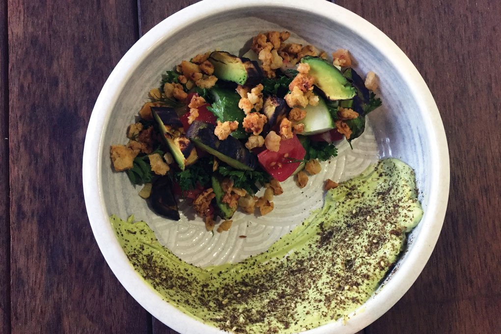 The Grilled Avocado Fattoush Salad at The Bellwether in Los Angeles buddies up to a creamy swipe of za’atar-spiced avocado yogurt.