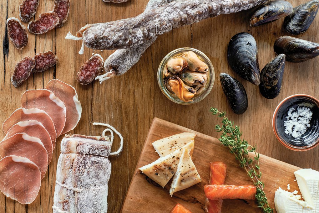 Prepared in house at Halifax in Hoboken, N.J., this seacuterie platter comes with maple- smoked wild salmon, smoked rainbow trout, smoked mussels, smoked pollock rillettes and marinated seafood salad.