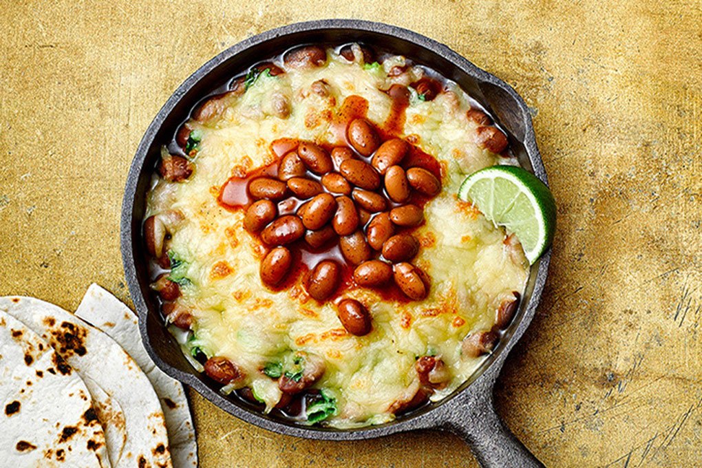 Texas Ranchero Queso Fundido, featuring Bush's new Texas Ranchero® Pinto Beans