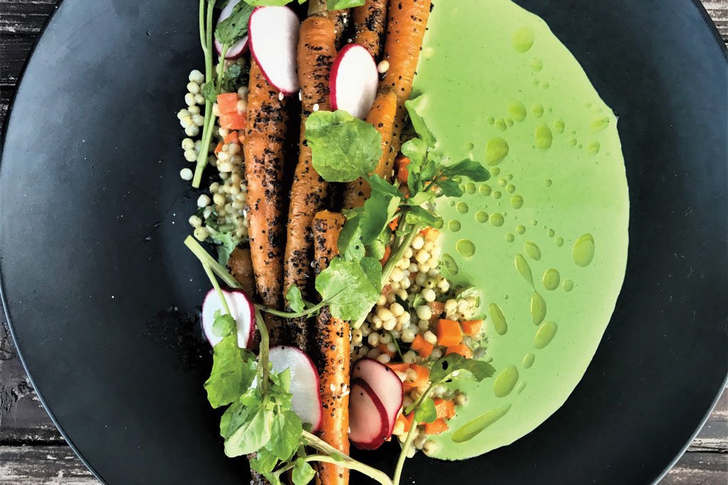 Roasted Everything Carrots at Restauration in Long Beach, Calif., highlights the contrasting textures of sorghum grain and herbed buttermilk.