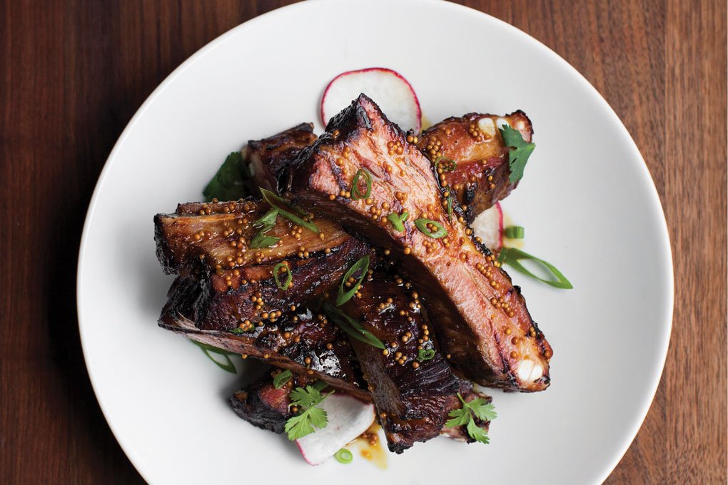 At Underbelly in Houston, the Ham Ribs are treated to a glaze made of sorghum, Dijon mustard and fish sauce.