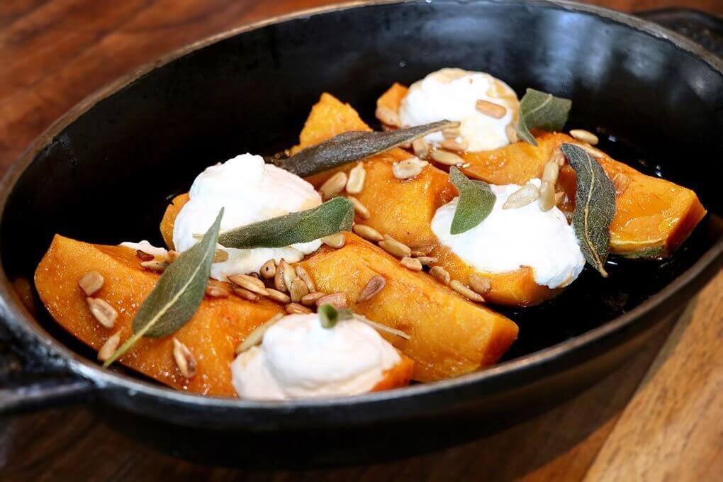 At MB Post in Manhattan Beach, Calif., multiple levels of texture elevate a vegetable side of Roasted Weiser Farms Honeynut Squash flavored with a Sherry-bourbon gastrique: roasted sunflower seeds, housemade ricotta and crispy sage.