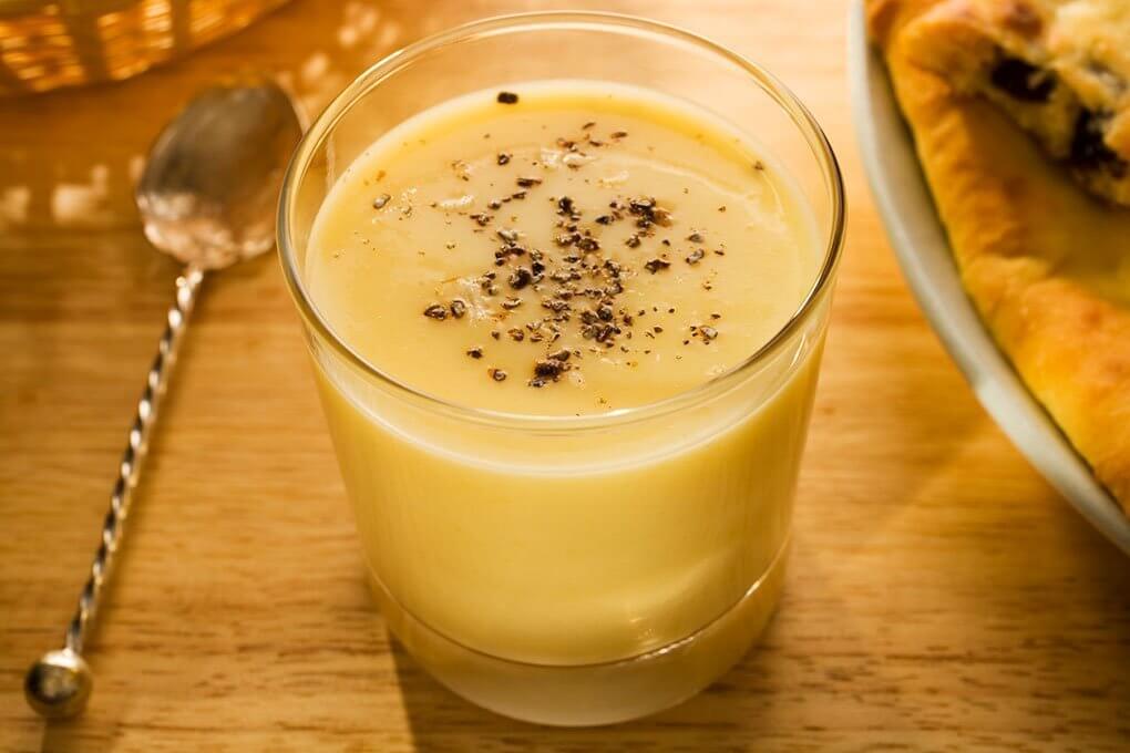 Indian beverages like this mango lassi with cardamom present trend-forward innovation opportunities for beverage menus