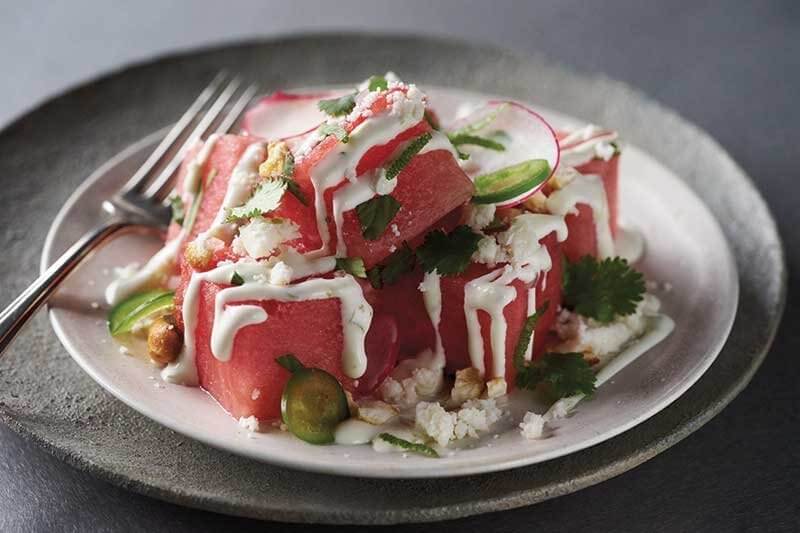 Cotija and crema offer a creamy contrast to watermelon