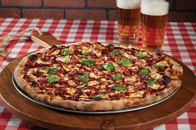 The BBQ Chicken pizza at Grimaldi's forwards the brand's coal-fired, brick-oven identity. Grilled chicken, barbecue sauce and fresh cilantro combine on this seasonal limited-time offering.