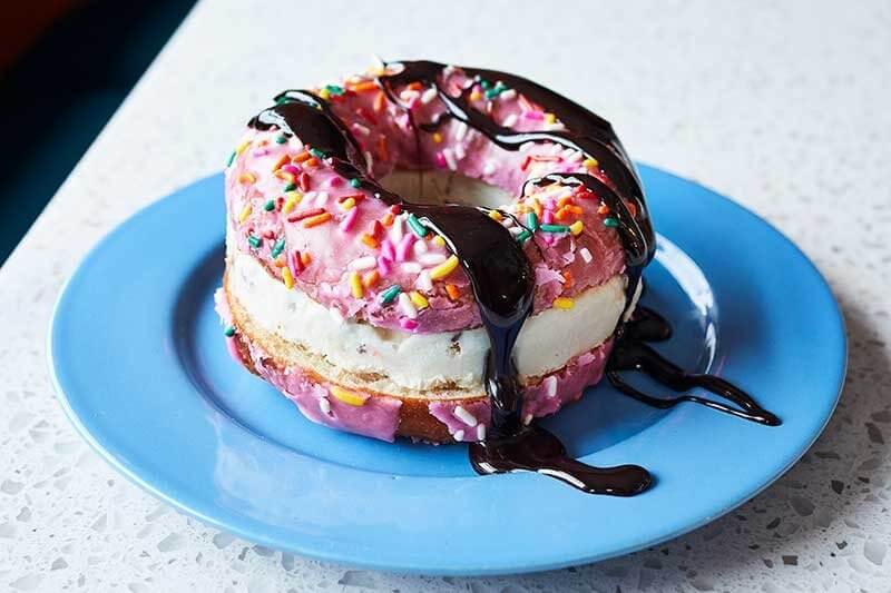 At The Mockingbird the Donut Sandwich stands out, capturing a playfulness that is now a hallmark of memorable brunch spots