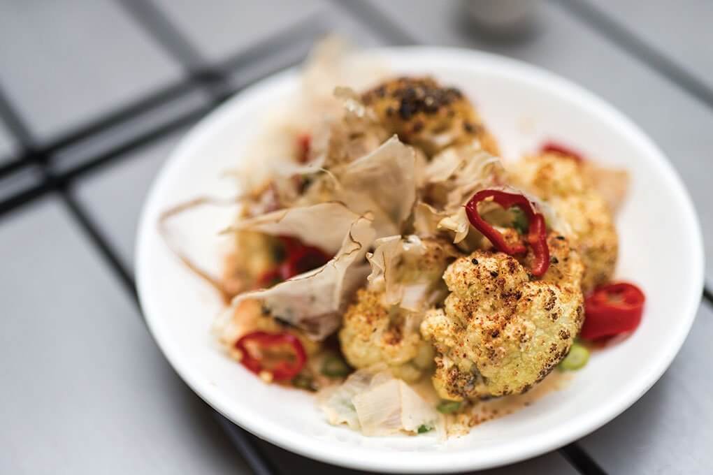 Compound butters make it simple to integrate new or unexpected flavors. At Ivan Ramen in New York, Miso-Roasted Cauliflower is combined with shio koji (rice malt seasoning) butter, Fresno chiles and bonito flakes.