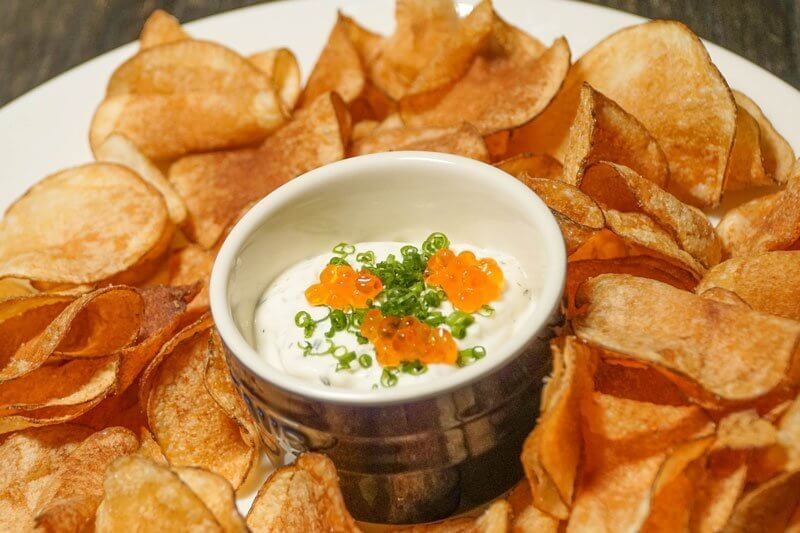 In Chicago, Split Rail’s French Onion Dip is topped with dollops of trout roe.