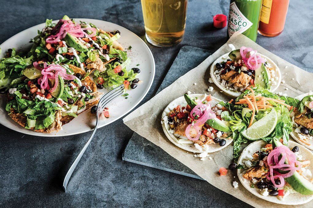 Rock Bottom’s Smoked Chicken Tostadas are positioned as an entrée, and are hugely successful, demonstrating big flavor touches like pulled chicken, black bean-corn salsa, Mexican crema and pickled red onion.