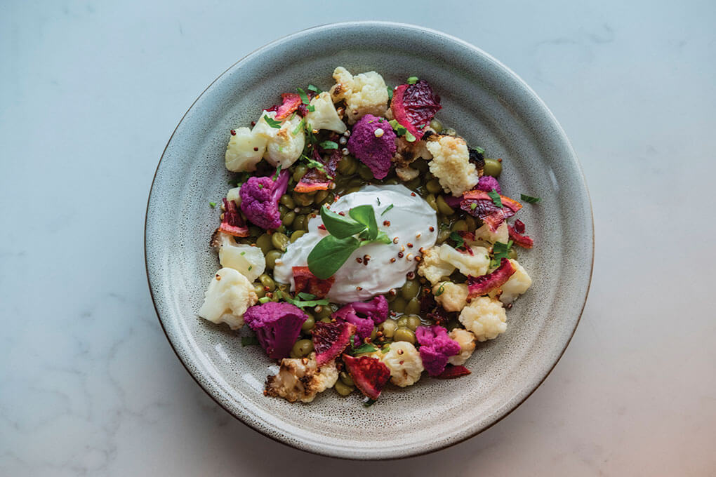 Cauliflower appetizer: roasted and pickled cauliflower, chickpeas, crispy quinoa, labneh