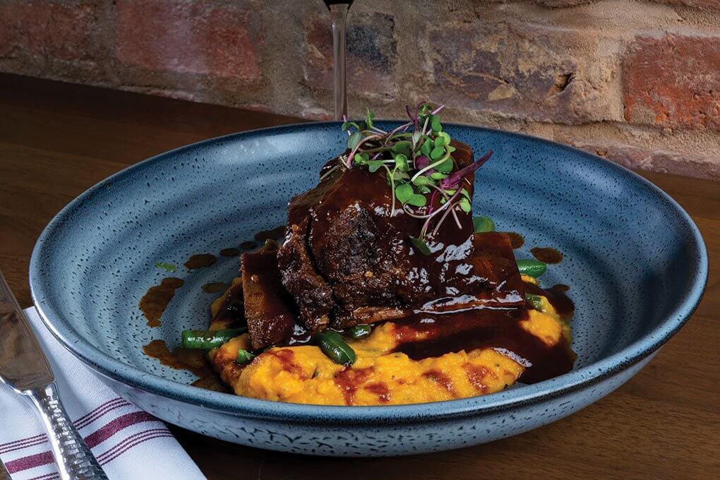 Slow-cooked prime short ribs, sweet potato mash, green beans