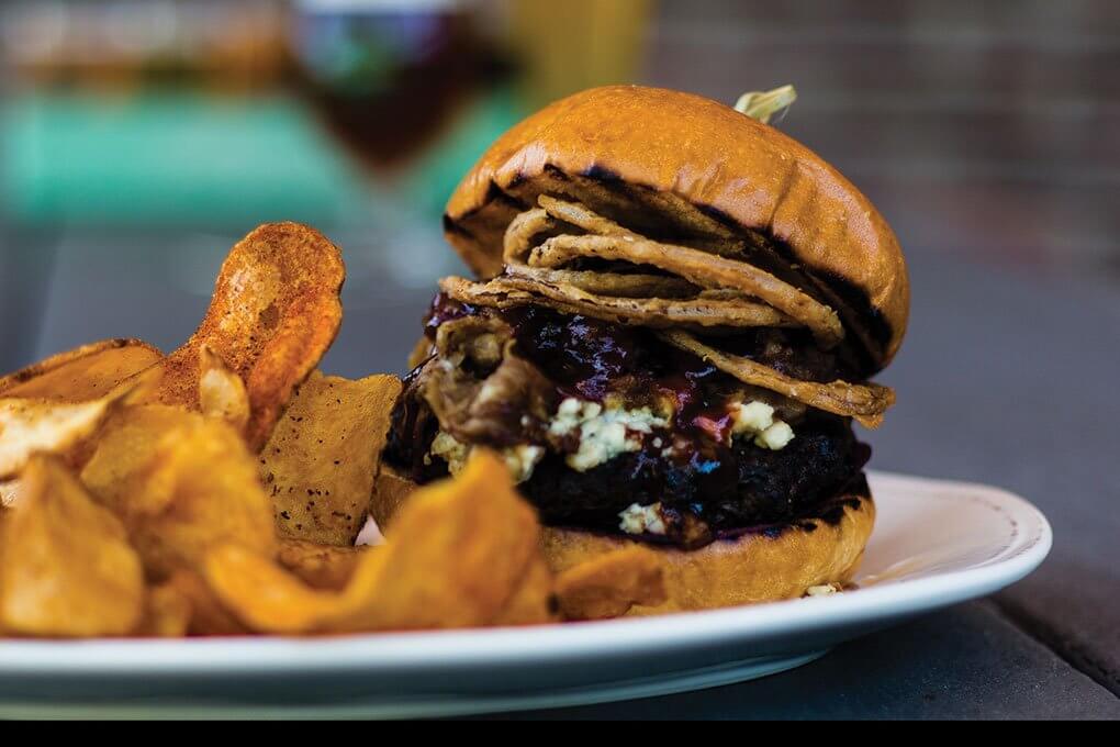 Brix Burger with bacon jam, brisket, barbecue sauce, pickled beets, blue cheese, fried onions