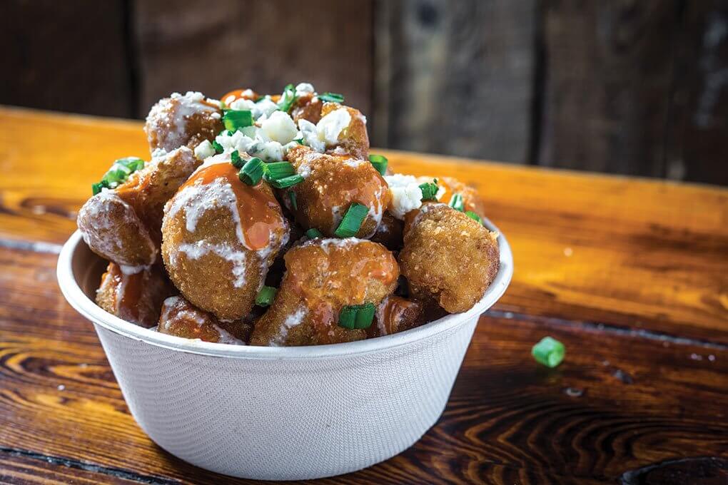 Breaded cauliflower florets, housemade Buffalo sauce, crumbled blue cheese, scallions